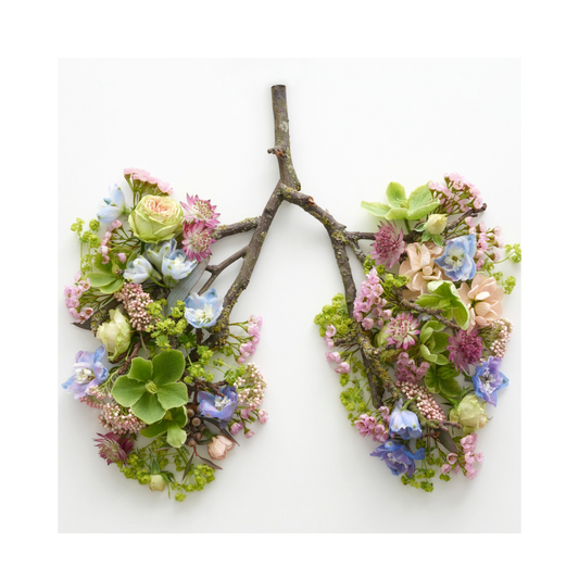 The image to look like lungs but made out of various spring blooming flowers on branches to represent lungs