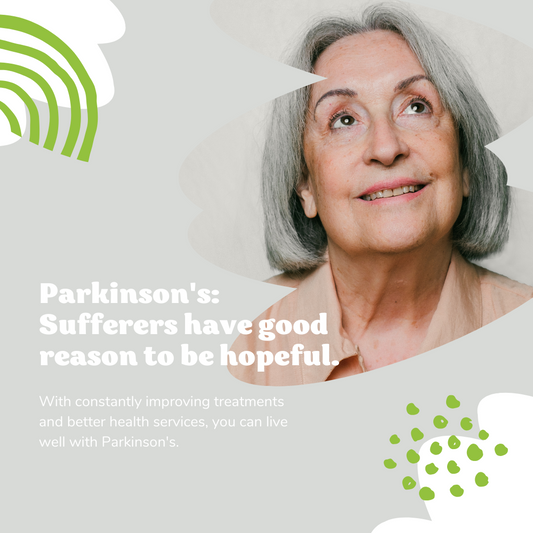 A gray haired women smiling as she considers the herbal support to help her Parkinson's Disease